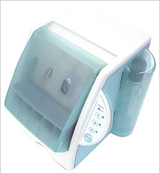 （自動洗浄注油器)